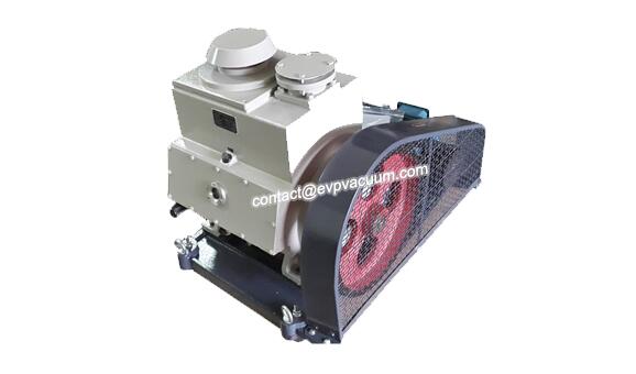 Rotary vane vacuum pump in solvent-free liner